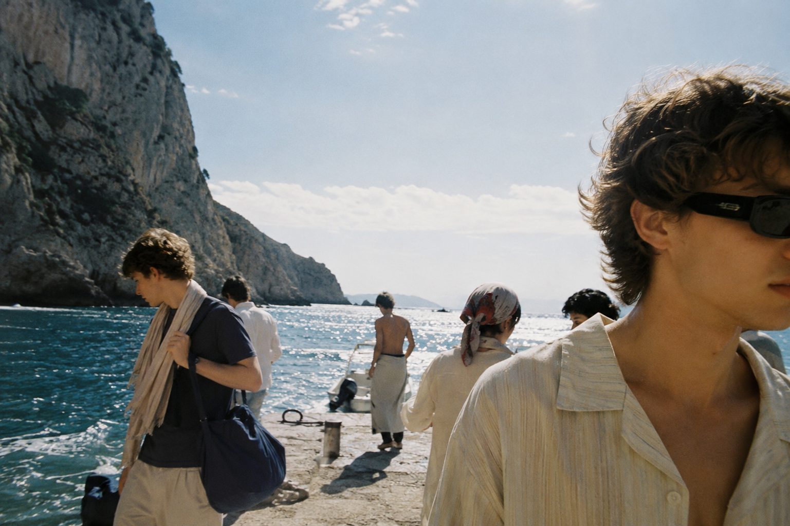 Mediterranean summer — candid at the cliff jetty